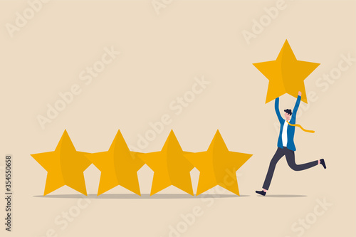 User experience, customer feedback stars rating or business and investment rating concept, businessman holding golden yellow star to added to 5 stars rating.