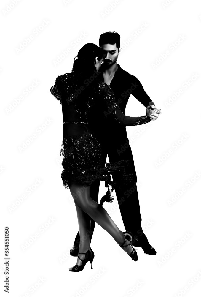 Passionate young couple dancing on white background Passionate young couple dancing on white background