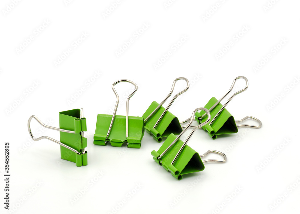 Five green paper clips on white background Five green paper clips on white background