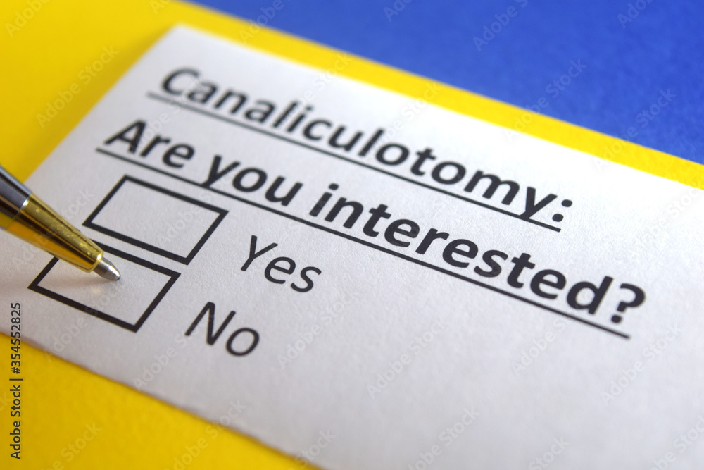 One person is answering question about canaliculotomy. One person is answering question about canaliculotomy.