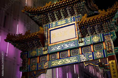 Photography The Chinatown gate at night in Soho, London.