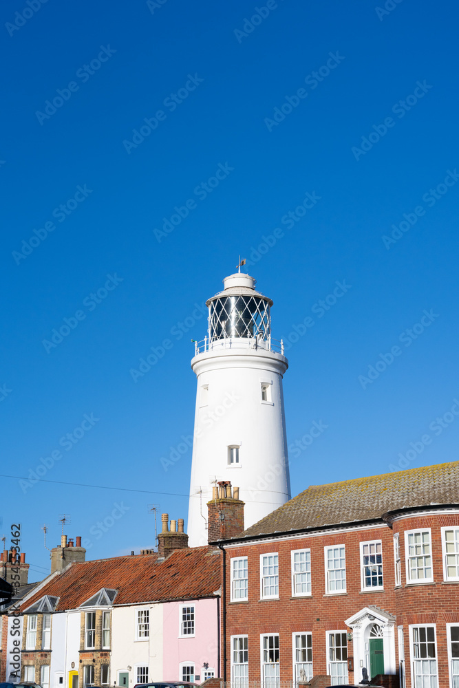 Old buildings with lighthouse in background. Southwold, Suffolk. UK. 17th January 2019.
