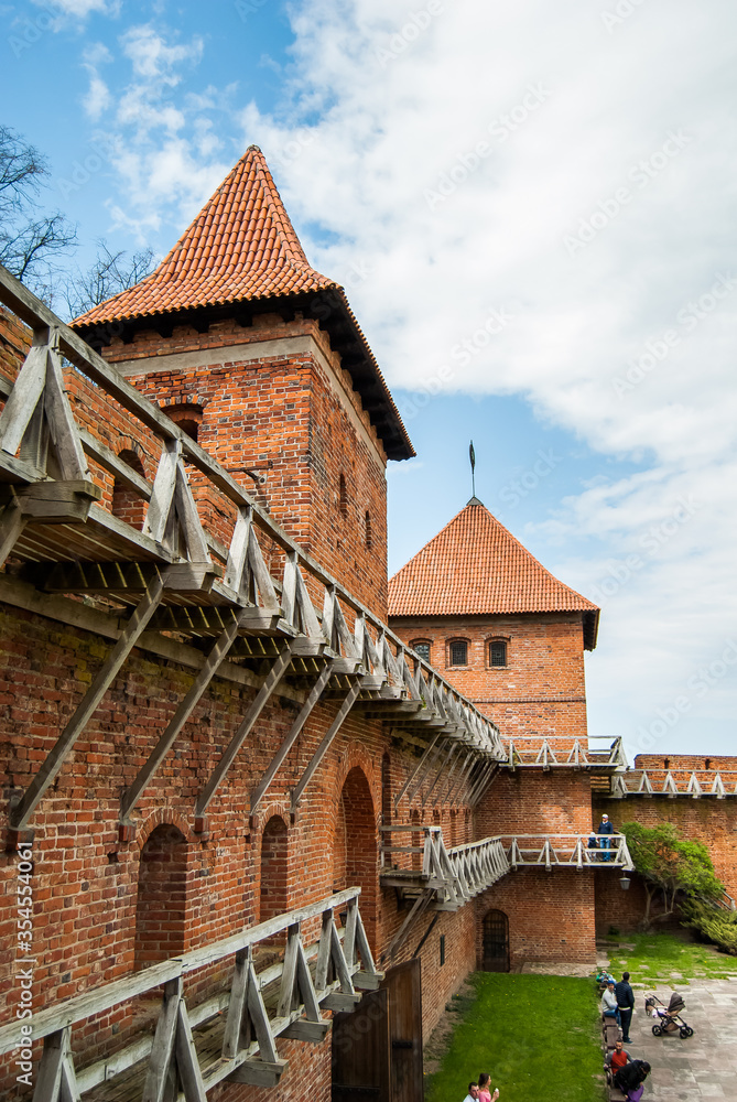 Frombork castle wall with towers. Frombork castle wall with towers.