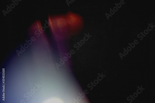 Purple light effect on black background. Retro film photography effect. Analog foto. Frame. redaction. 90s 