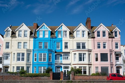 Buildings on Crag Path facing Aldeburgh Beach with a blue sky. Aldeburgh, Suffolk. UK. 5th September 2019.