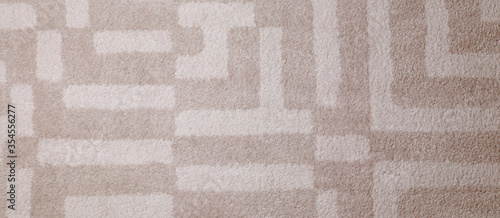 Soft beige carpet texture as background, top view. Banner design