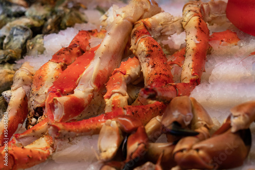 Crab legs sea food on ice background
