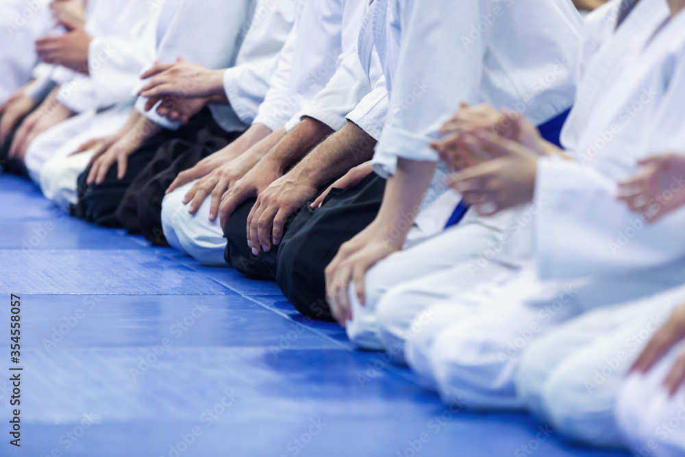 People in kimono and hakama on martial arts training People in kimono and hakama on martial arts training