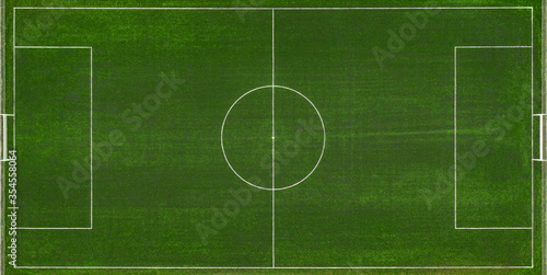 aerial view of a green football field at day time