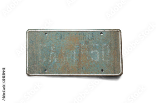 Old license plate isolated on white background