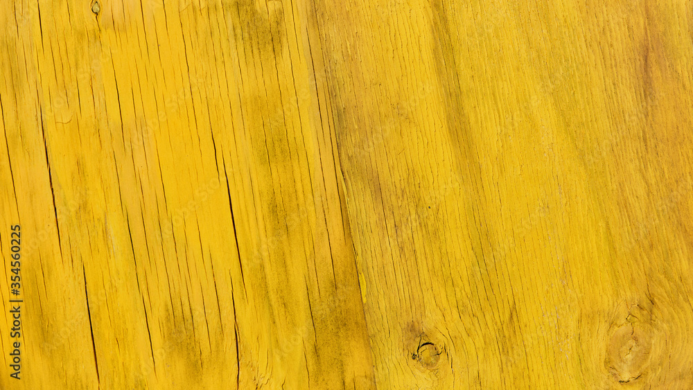 Fototapeta premium Maserung von gelbem Holz als Hintergrund Textur