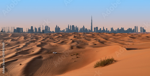 Dubai skyline and desert landscape.