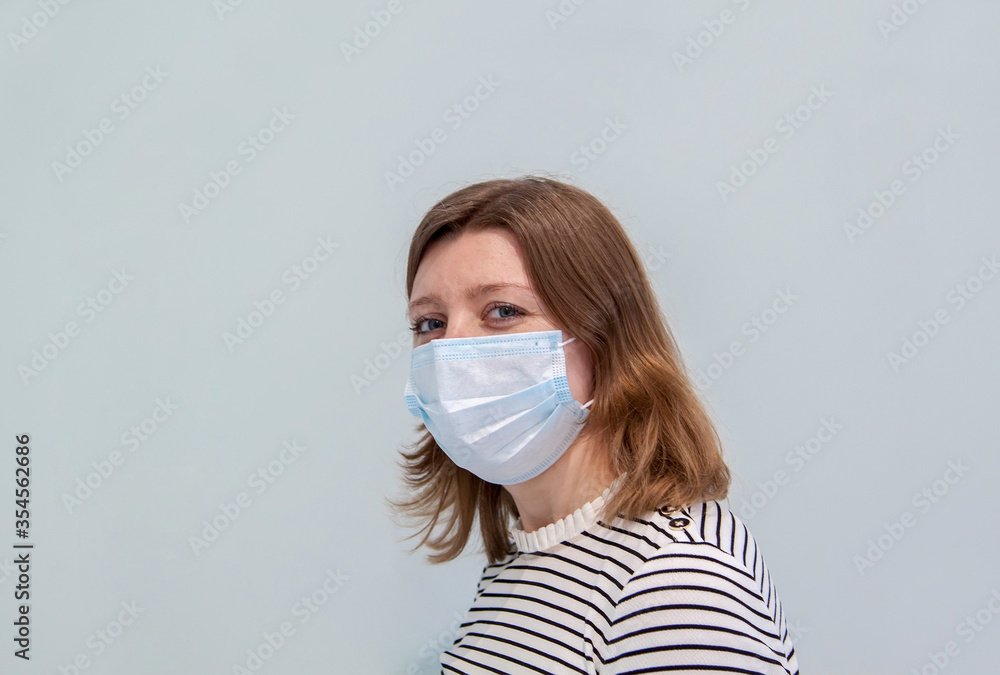 woman wearing an anti-virus protection mask to prevent flu infection, allergies, virus protection, COVID-19, and corona virus pandemic disease 2019 woman wearing an anti-virus protection mask to prevent flu infection, allergies, virus protection, COVID-19, and corona virus pandemic disease 2019