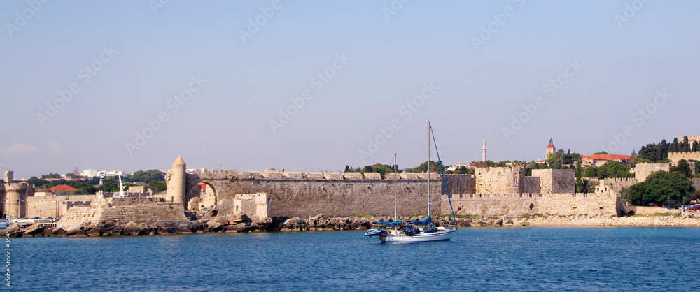 Rhodes, Mandraki harbour, view of the fortifications of the Old Town of Rhodes
