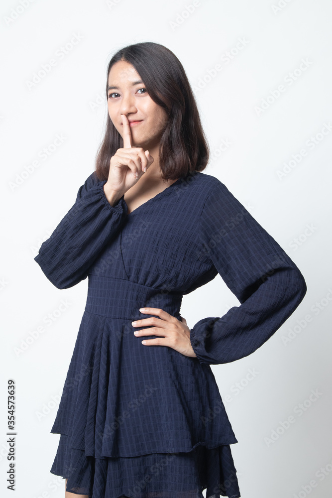 Asian girl show quite hand sign.