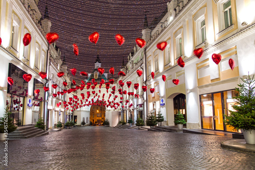 Decoration by baloons in red hearts form and christmas lights for Saint Valentine's Day at Tretyakovsky Proyezd street in Moscow