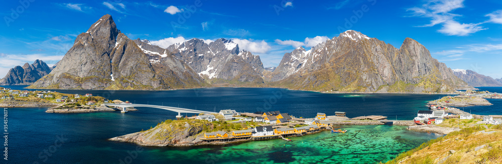 Island of Hamnoy, Lofoten Islands, northern Norway. Norwegian fishing village with  Fjord and Mountain In Background