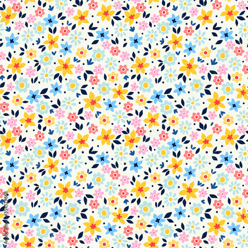 Simple cute pattern in small colorful flowers on white background. Liberty style. Ditsy print. Floral seamless background. The elegant the template for fashion prints.