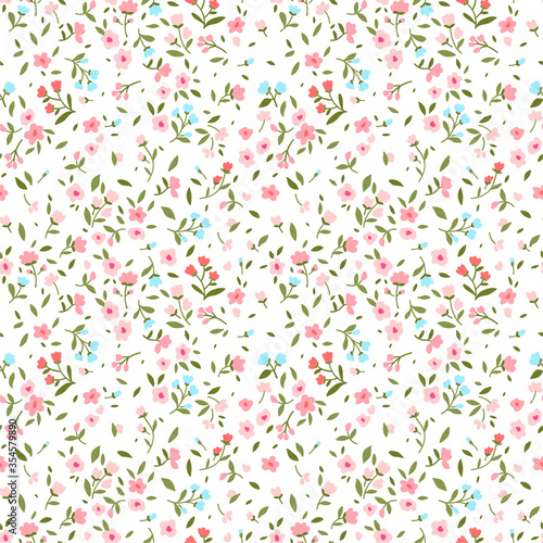 Vintage floral background. Seamless vector pattern for design and fashion prints. Flowers pattern with small pink and red flowers on a light ivory background. Ditsy style.