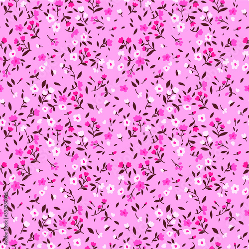 Vector seamless pattern. Pretty pattern in small flower. Small white and pink flowers. Pale pink background. Ditsy floral background. The elegant the template for fashion prints.
