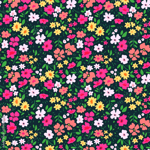 Elegant floral pattern in small multi colored flower. Liberty style. Floral seamless background for fashion prints. Ditsy print. Seamless vector texture. Spring bouquet. © ann_and_pen