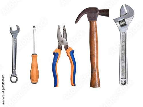 Set of tool many mechanical tools . wrench . Slotted screwdriver . Plier , old hammer on white background isolated.