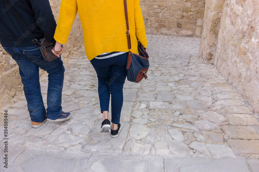 couple walking through the castle of Alicante
