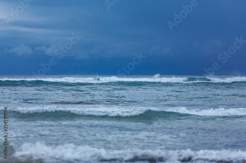 dramatic sky over a sea with waves, stormy sea waves