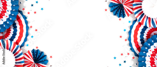 4th of July American Independence Day. Happy Independence Day. Red, blue and white star confetti, paper decorations on white background. Flat lay, top view, copy space, banner