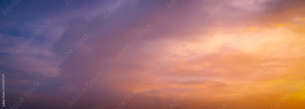 Beautiful dark orange sky evening beauty and Clouds at sunset , Panoramic scene view . Natural background 