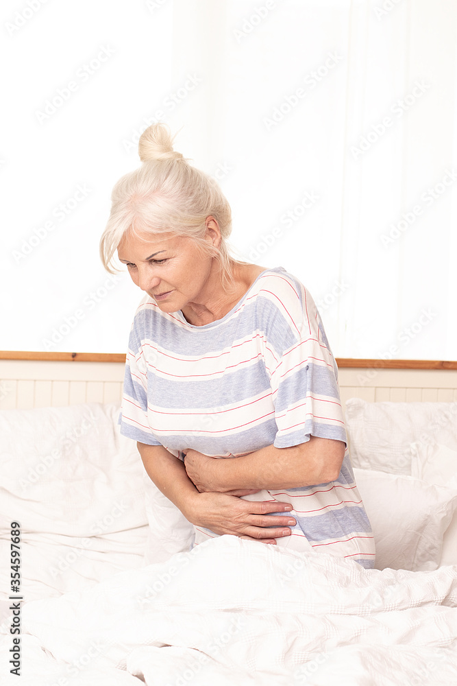 Sick senior woman in bed, at home. Sick senior woman in bed, at home.