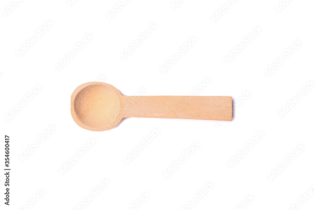 Wooden spoon isolated on white background. Top view.