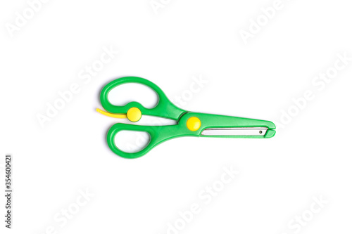 Green scissors isolated on white background