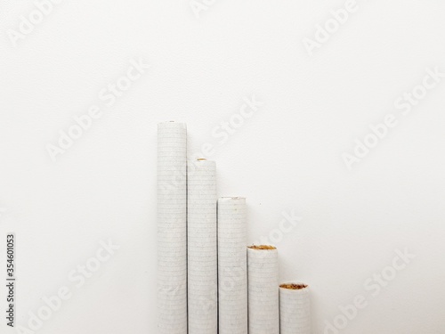 A few cigarettes on a white background.