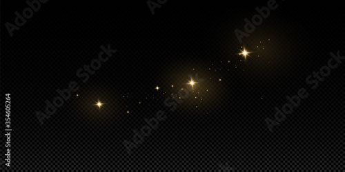 Glow light effect.  Vector sparkles on a transparent background. Christmas light effect. Sparkling magical dust particles.The dust sparks and golden stars shine with special light.
