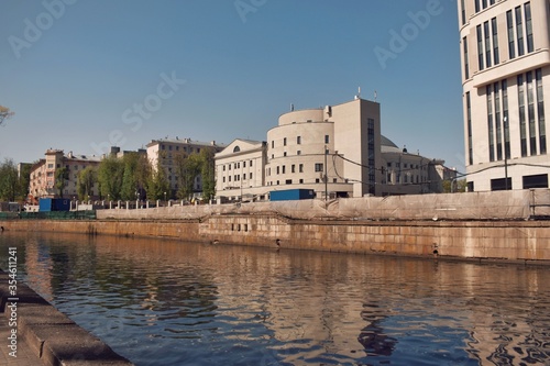 Svisloch river in Gorky park in Minsk, Belarus. Sunny summer day in entertainment park