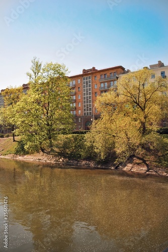 Svisloch river in Gorky park in Minsk, Belarus. Sunny summer day in entertainment park