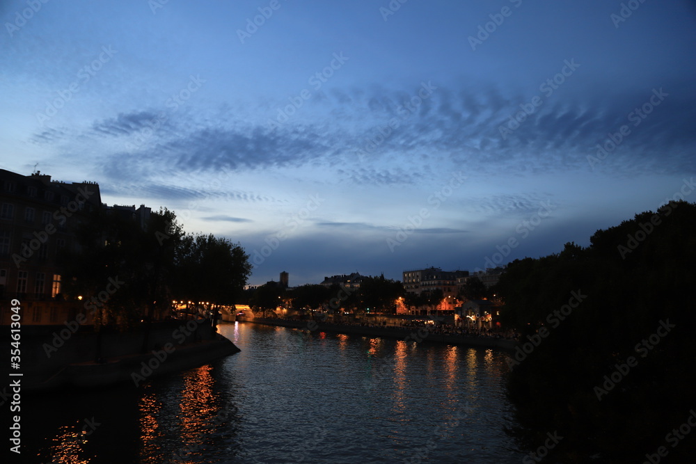 sunset over the river in paris france
