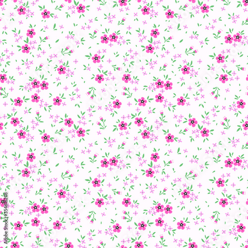 Vector seamless pattern. Pretty pattern in small flower. Small pink flowers. White background. Ditsy floral background. The elegant the template for fashion prints.