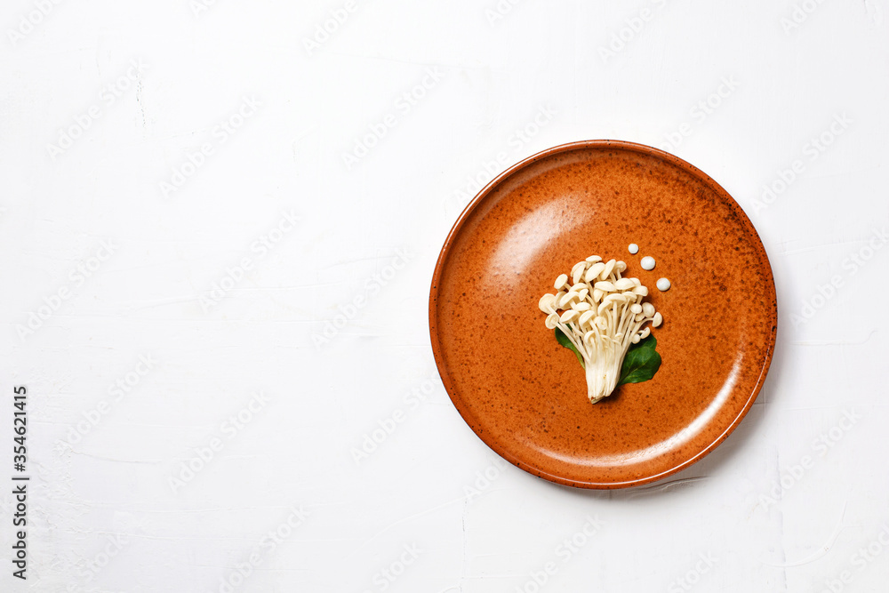 Fototapeta premium Enoki, Enokitake, Flammulina velutipes, edible mushroom popular in Japanese cuisine