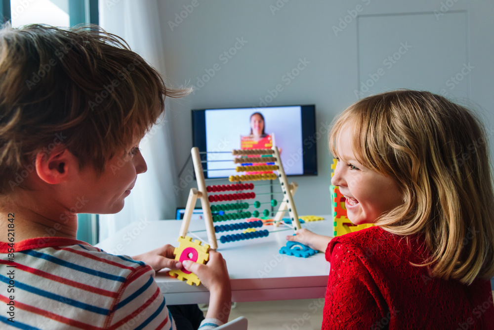 kids having online math lesson at home, distant learning - obrazy, fototapety, plakaty 