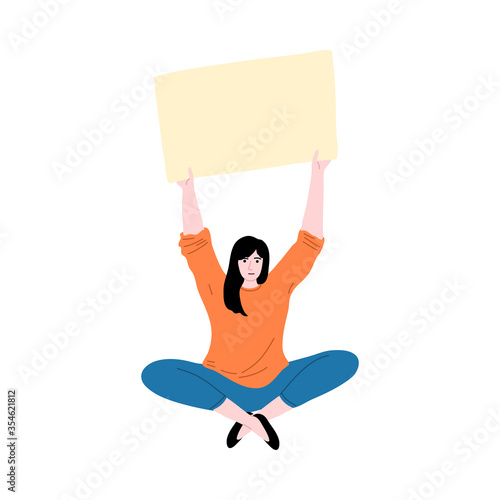 Woman sitting and protesting agaist something with placard in hands