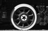 Old wheel with star of a Soviet military steam locomotive