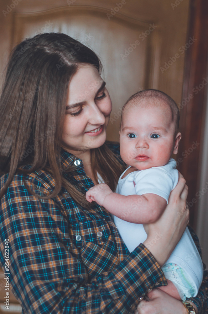 mom with little son. newborn boy