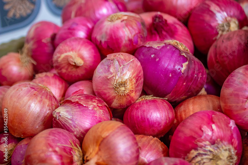 image of indian raw , red and purple organic onions