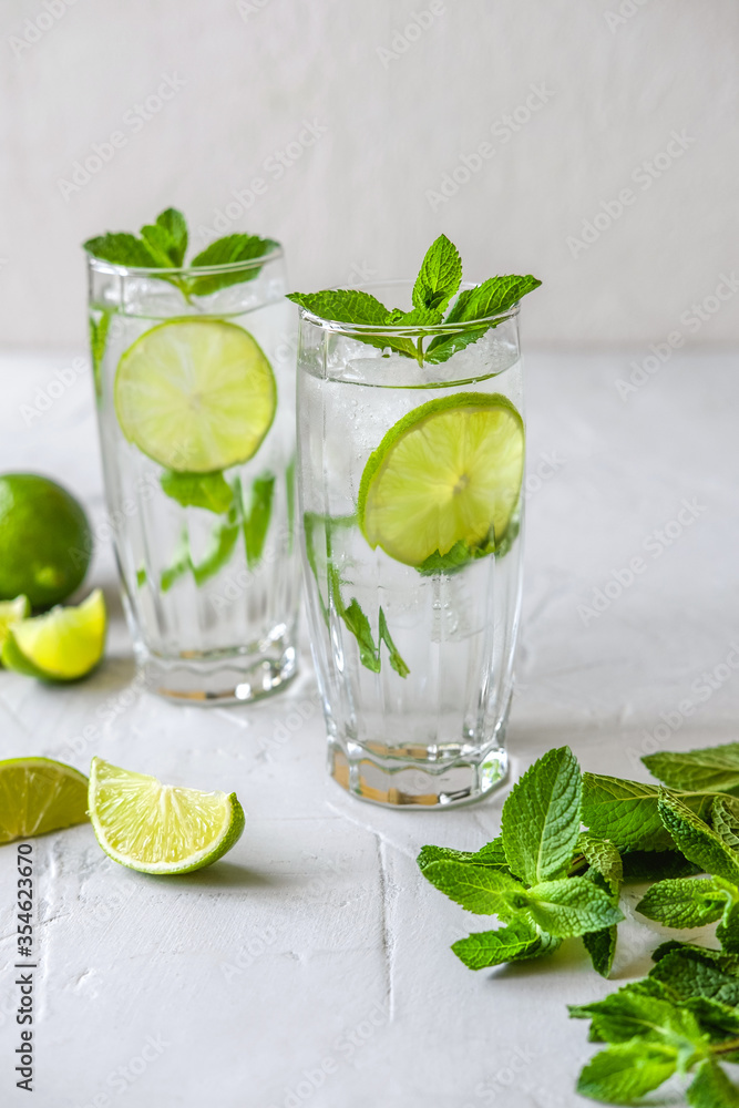 Two glasses of mojito. Making Mojito Cocktail At Home.
