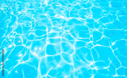 Blue water texture in swimming pool