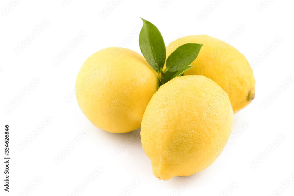 3 yellow lemons and leaves isolated on a white background with clipping path