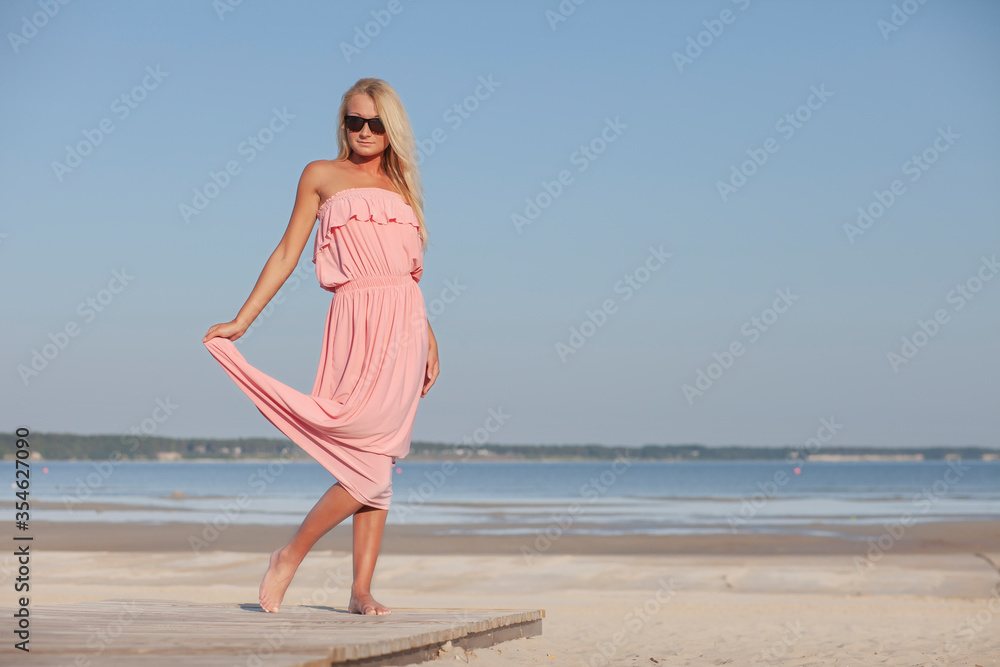 Beautiful woman enjoying summer outdoors Beautiful woman enjoying summer outdoors