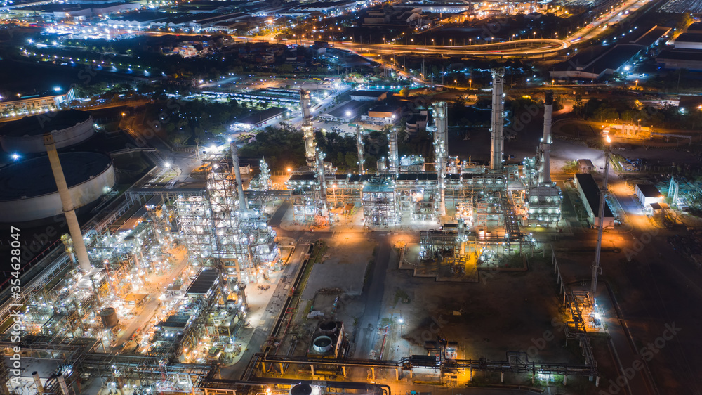 Aerial view by drone of oil petrochemical refinery plant during  sunset time